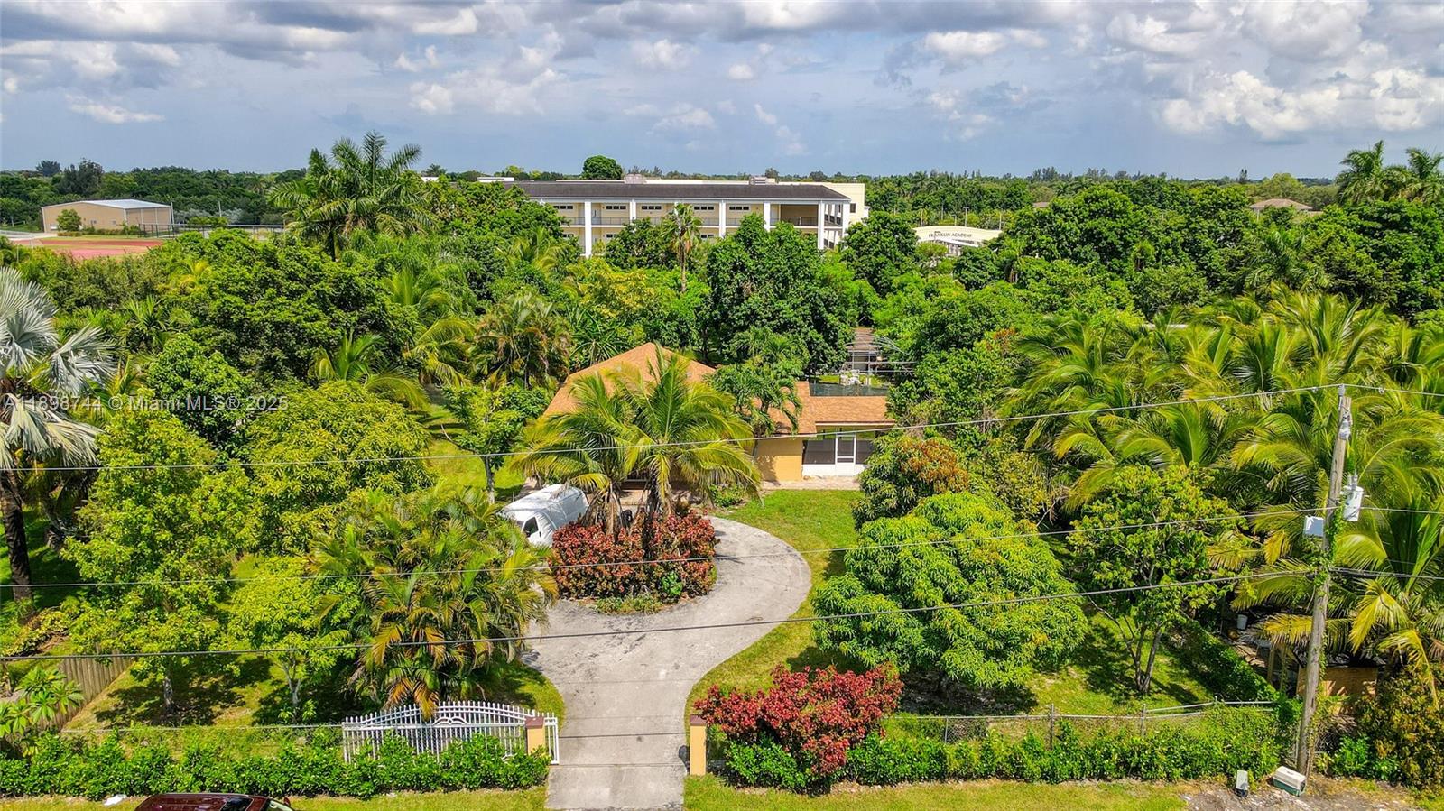 5130 Southwest 208th Lane Southwest Ranches, FL 33332 - Photo 47 of 53 a view of a garden with plants and a pathway