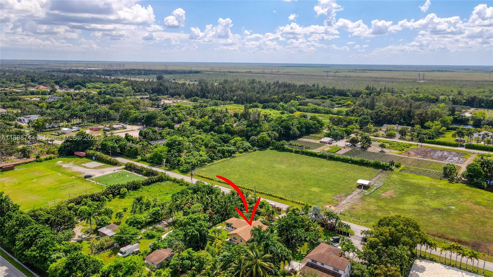 5130 Southwest 208th Lane Southwest Ranches, FL 33332 - Photo 50 of 53 a view of a city with an ocean