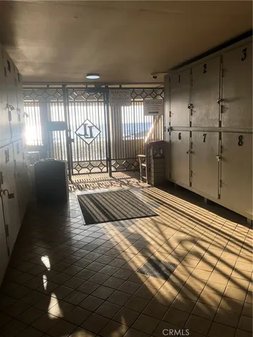 a bedroom with a bed and a walk in closet