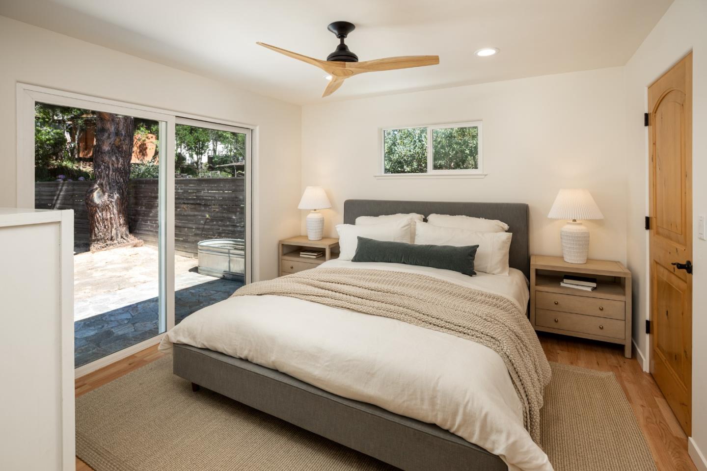 6932 Freedom Boulevard Aptos, CA 95003 - Photo 14 of 49 a bedroom with a large bed and a balcony