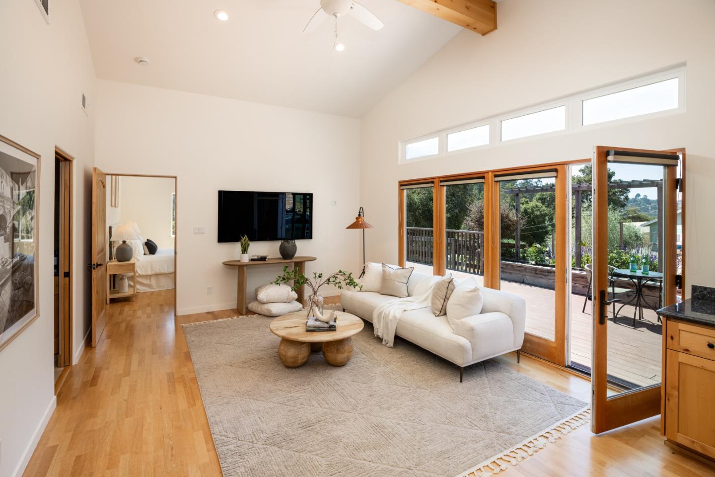 6932 Freedom Boulevard Aptos, CA 95003 - Photo 21 of 49 a living room with furniture and a flat screen tv