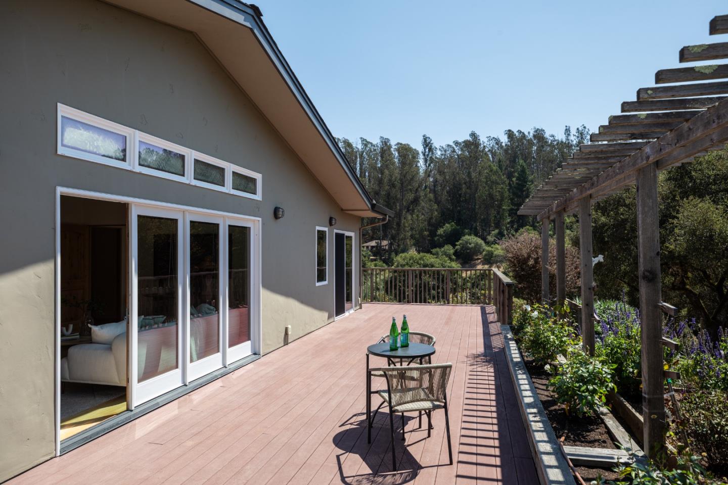 6932 Freedom Boulevard Aptos, CA 95003 - Photo 29 of 49 a wooden bench sitting in front of a building