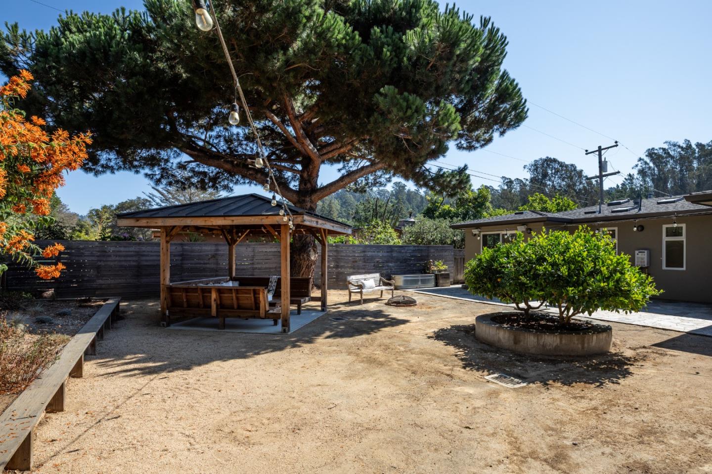 6932 Freedom Boulevard Aptos, CA 95003 - Photo 40 of 49 a view of a backyard with sitting area and furniture