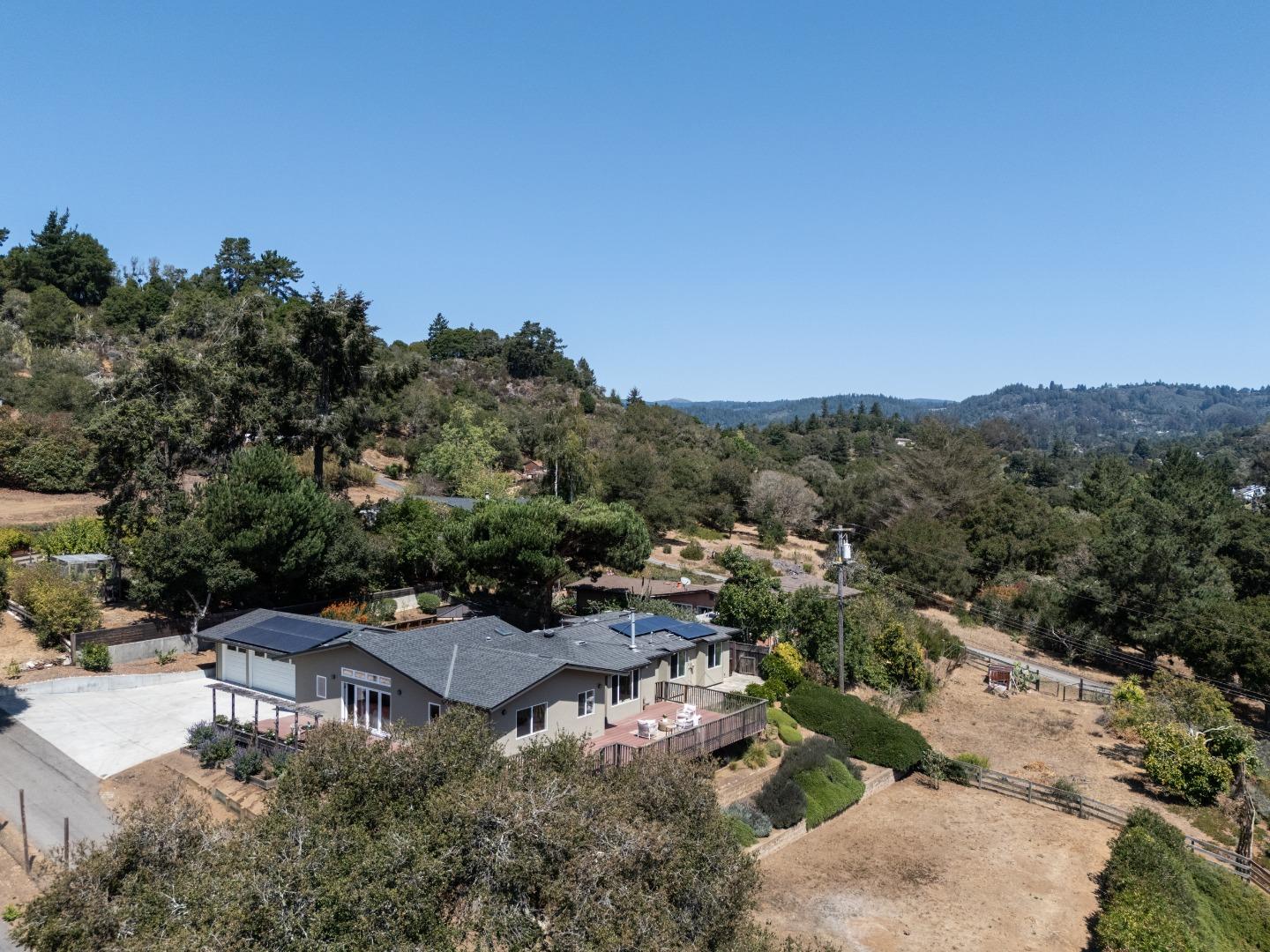 6932 Freedom Boulevard Aptos, CA 95003 - Photo 44 of 49 a view of a house with a mountain in the background