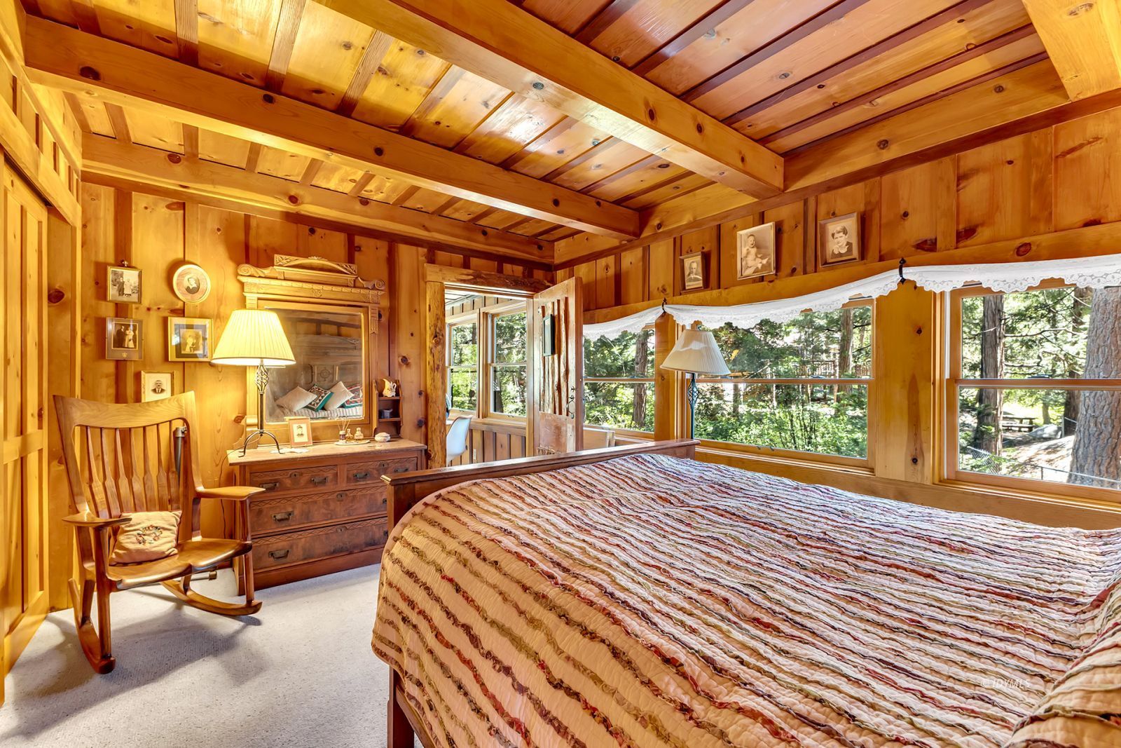 25100 Indian Rock Road Idyllwild, CA 92549 - Photo 51 of 75 a bed room with a bed and a large window