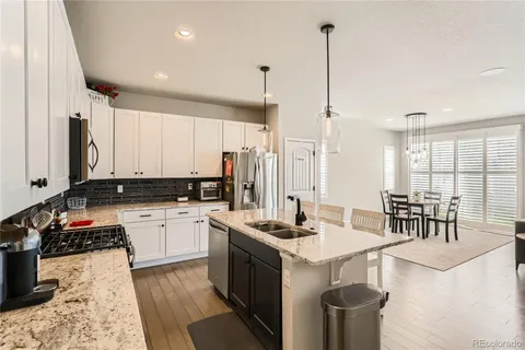 a bed room with a bed and a window