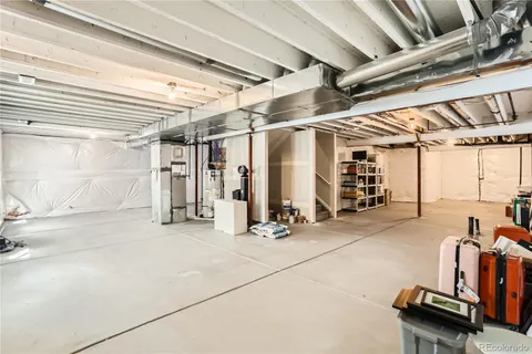 a view of kitchen stove and cabinets