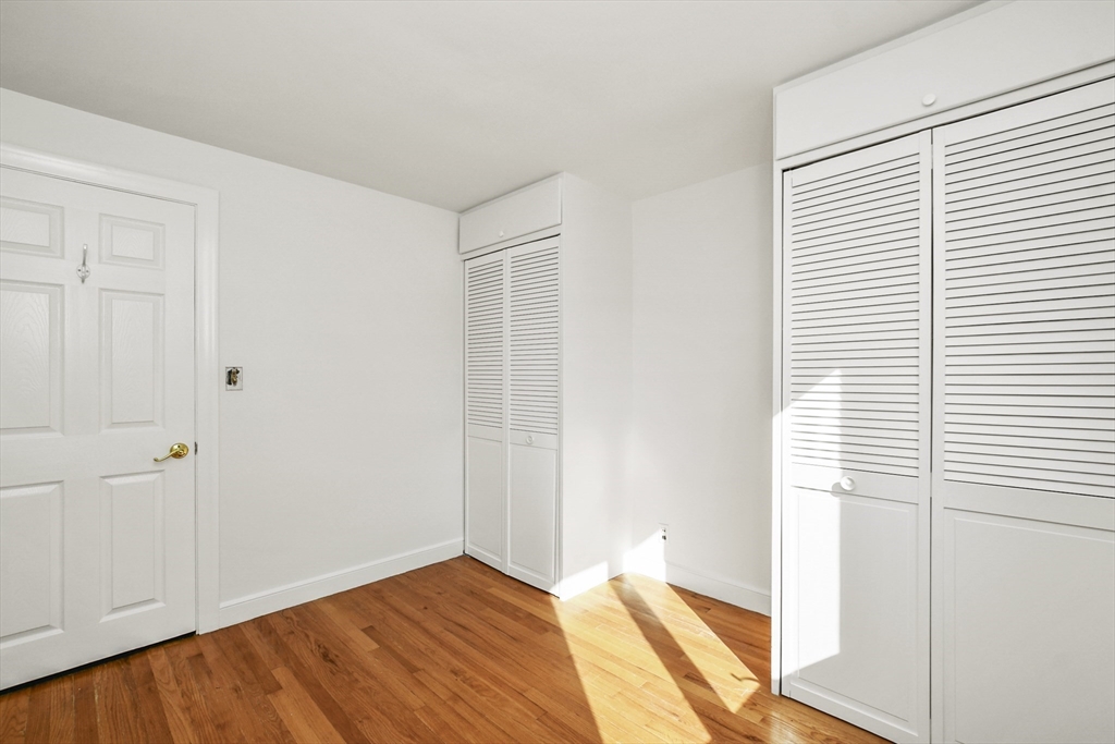 25 Anna Road Woburn, MA 01801 - Photo 21 of 39 a view of a room that has a window in it
