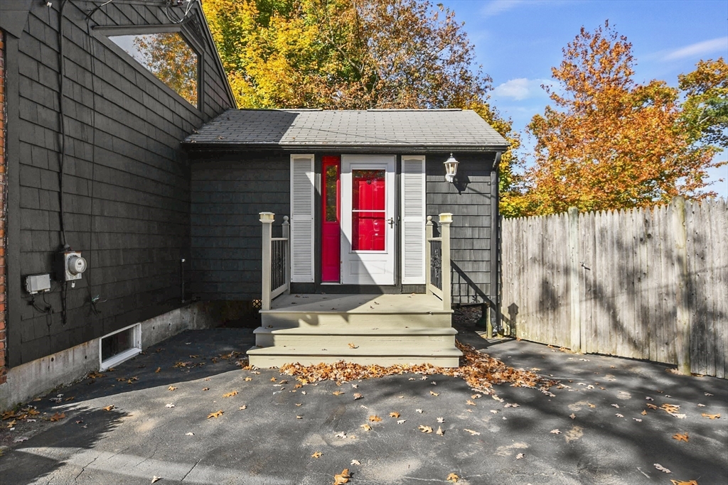 25 Anna Road Woburn, MA 01801 - Photo 33 of 39 a front view of a house with a yard