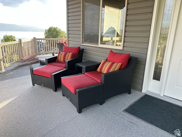 1940 East Shore Road St. Charles, ID 83272 - Photo 10 of 64 View of patio / terrace featuring a deck with water view