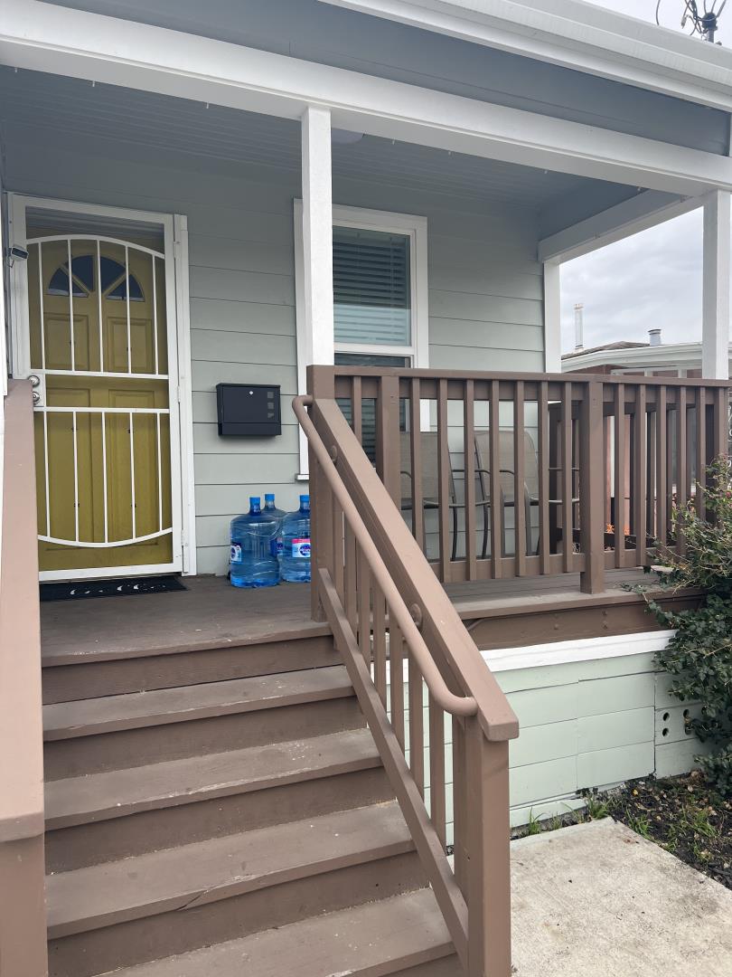 1132 85th Avenue Oakland, CA 94621 - Photo 5 of 28 a view of entryway and hall with wooden floor