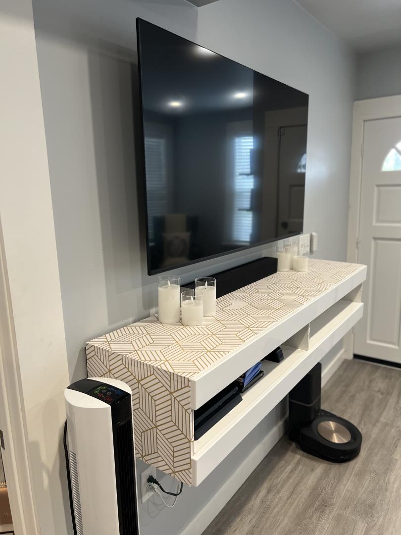1132 85th Avenue Oakland, CA 94621 - Photo 8 of 28 a bathroom with a sink and a mirror