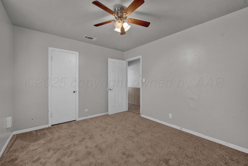 108 Spruce Avenue Dumas, TX 79029 - Photo 12 of 15 a view of an empty room