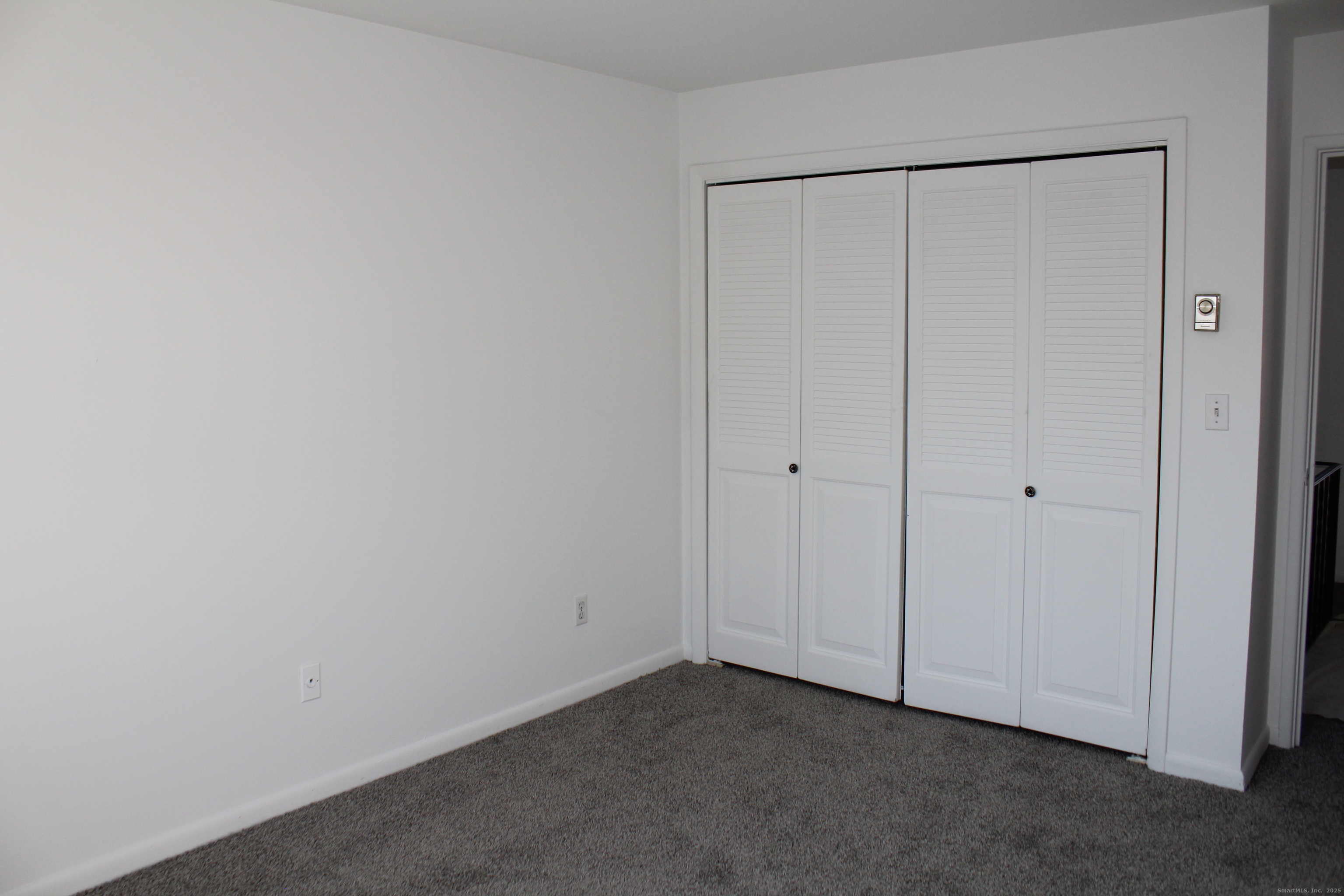 39 Woodway Road, Unit C7 Stamford, CT 06907 - Photo 11 of 18 a view of an empty room