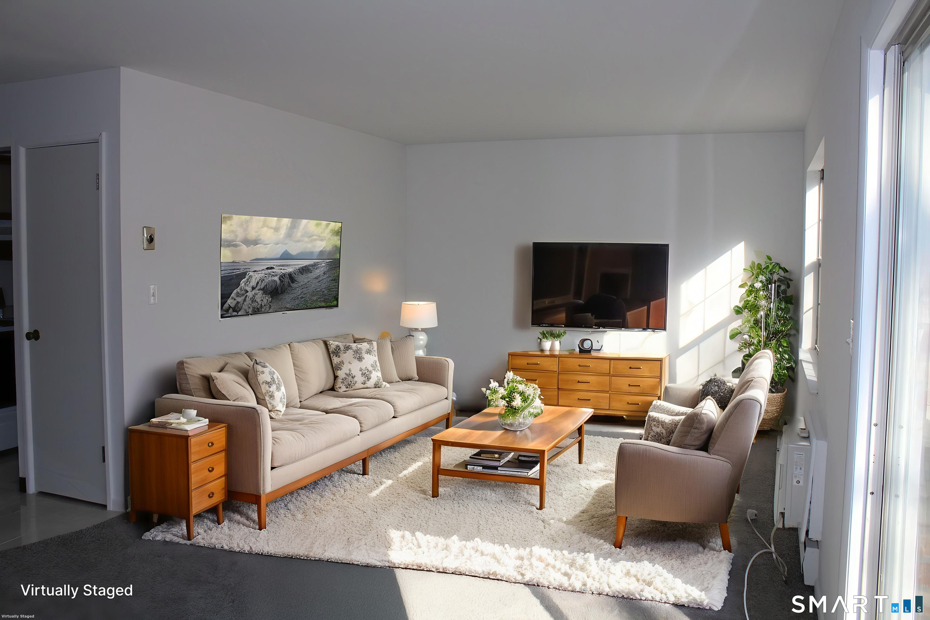 39 Woodway Road, Unit C7 Stamford, CT 06907 - Photo 2 of 18 a living room with furniture and a flat screen tv