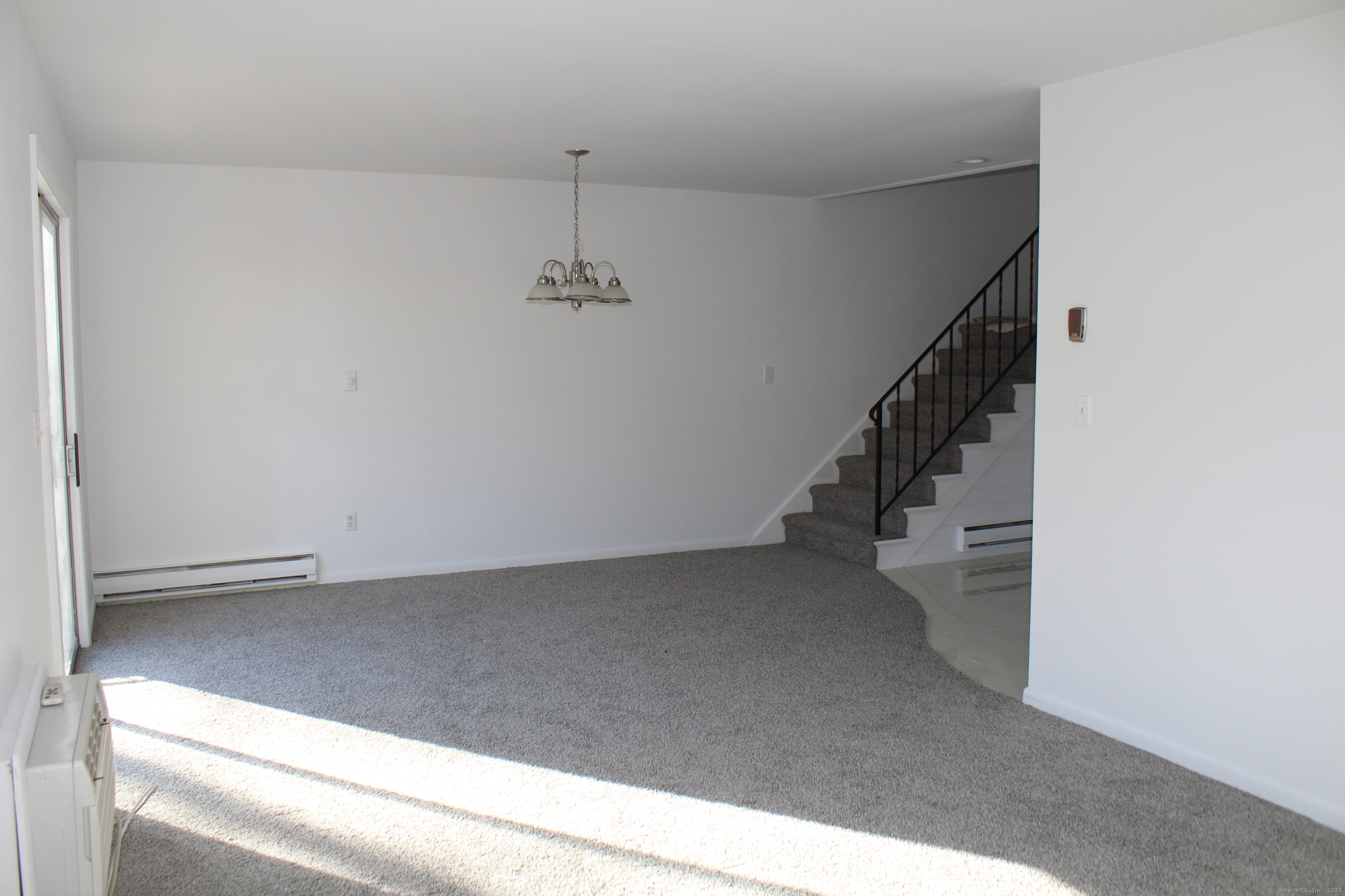 39 Woodway Road, Unit C7 Stamford, CT 06907 - Photo 6 of 18 a view of hallway with stairs