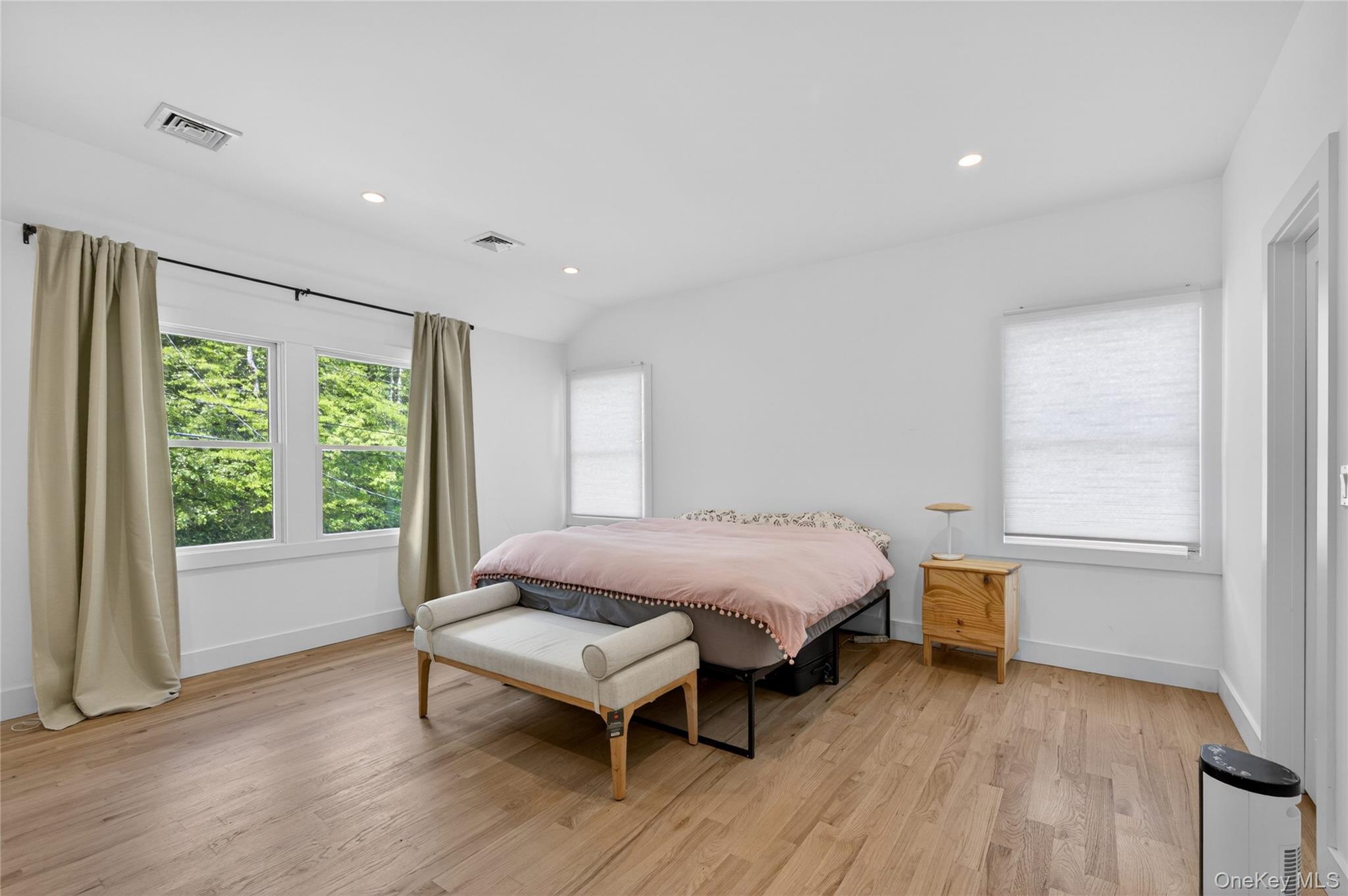 534 Riverside Avenue Massapequa, NY 11758 - Photo 14 of 28 a bedroom with a bed and a window