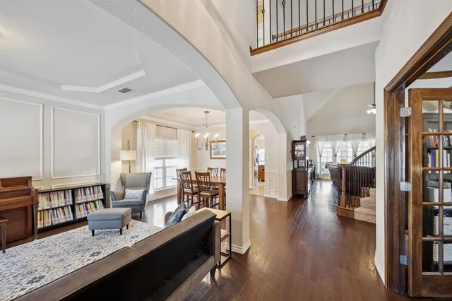 a living room with furniture and a table
