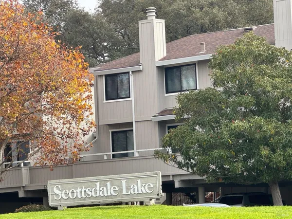 a front view of a building with garden