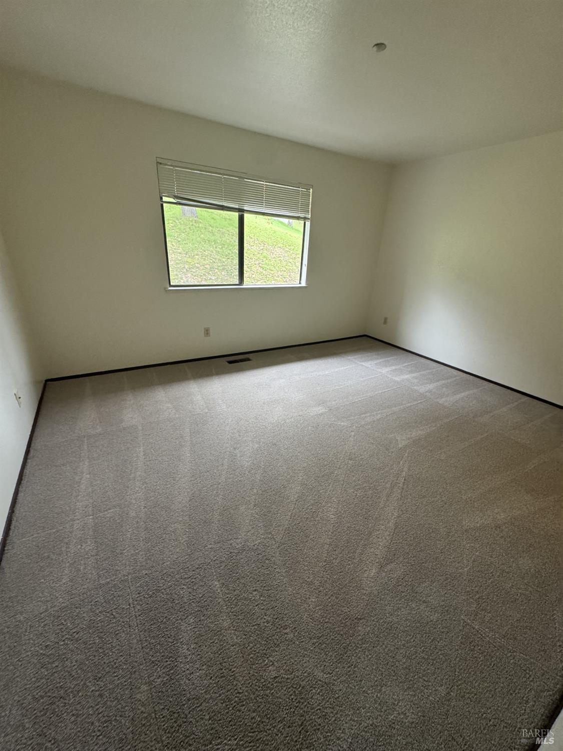 33 Lakeview Court Novato, CA 94947 - Photo 14 of 18 an empty room with a window
