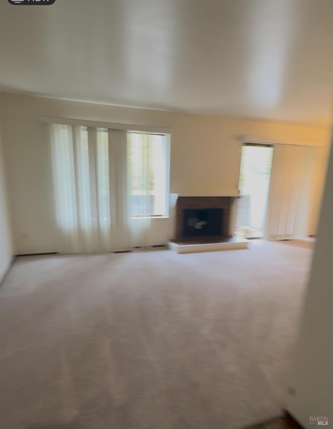 33 Lakeview Court Novato, CA 94947 - Photo 6 of 18 an empty room with a fireplace