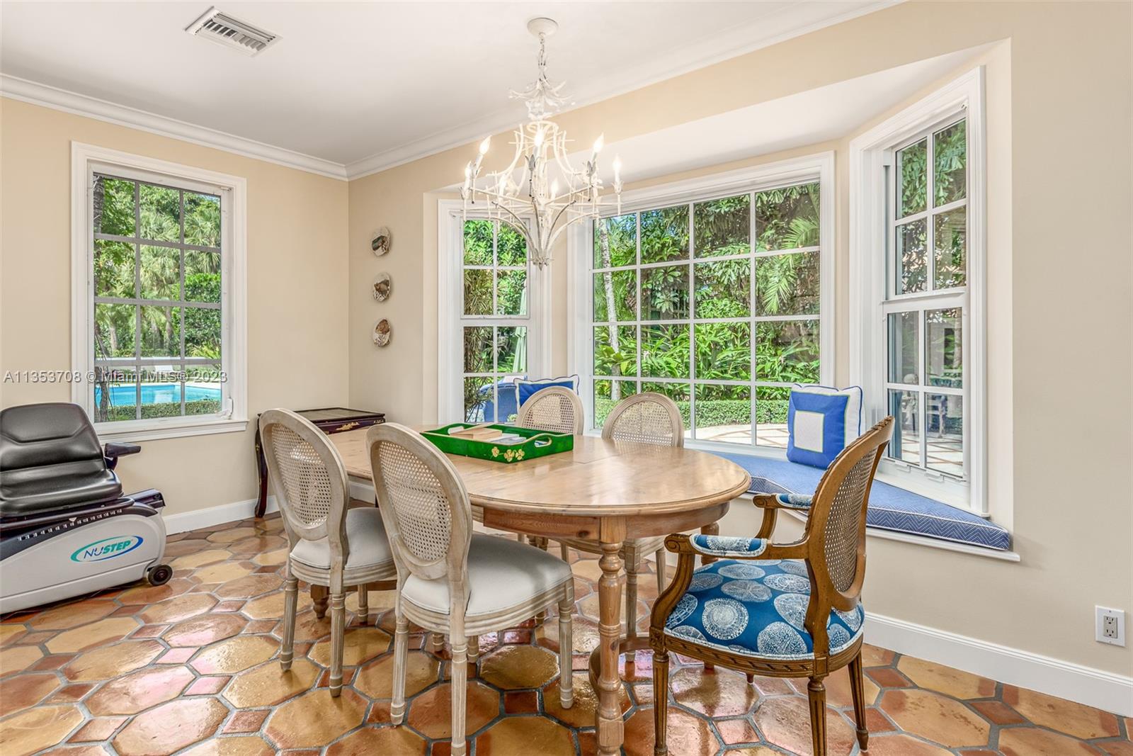 115 Gomez Road Jupiter Island, FL 33455 - Photo 5 of 20 a view of a dining room with furniture window and outside view
