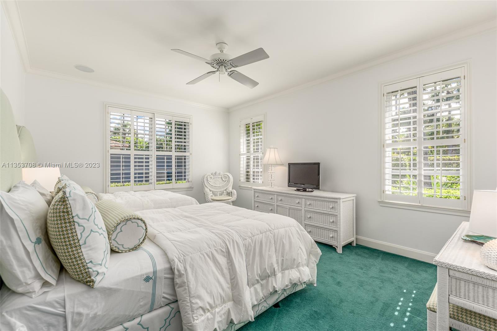 115 Gomez Road Jupiter Island, FL 33455 - Photo 6 of 20 a bedroom with a bed and a window