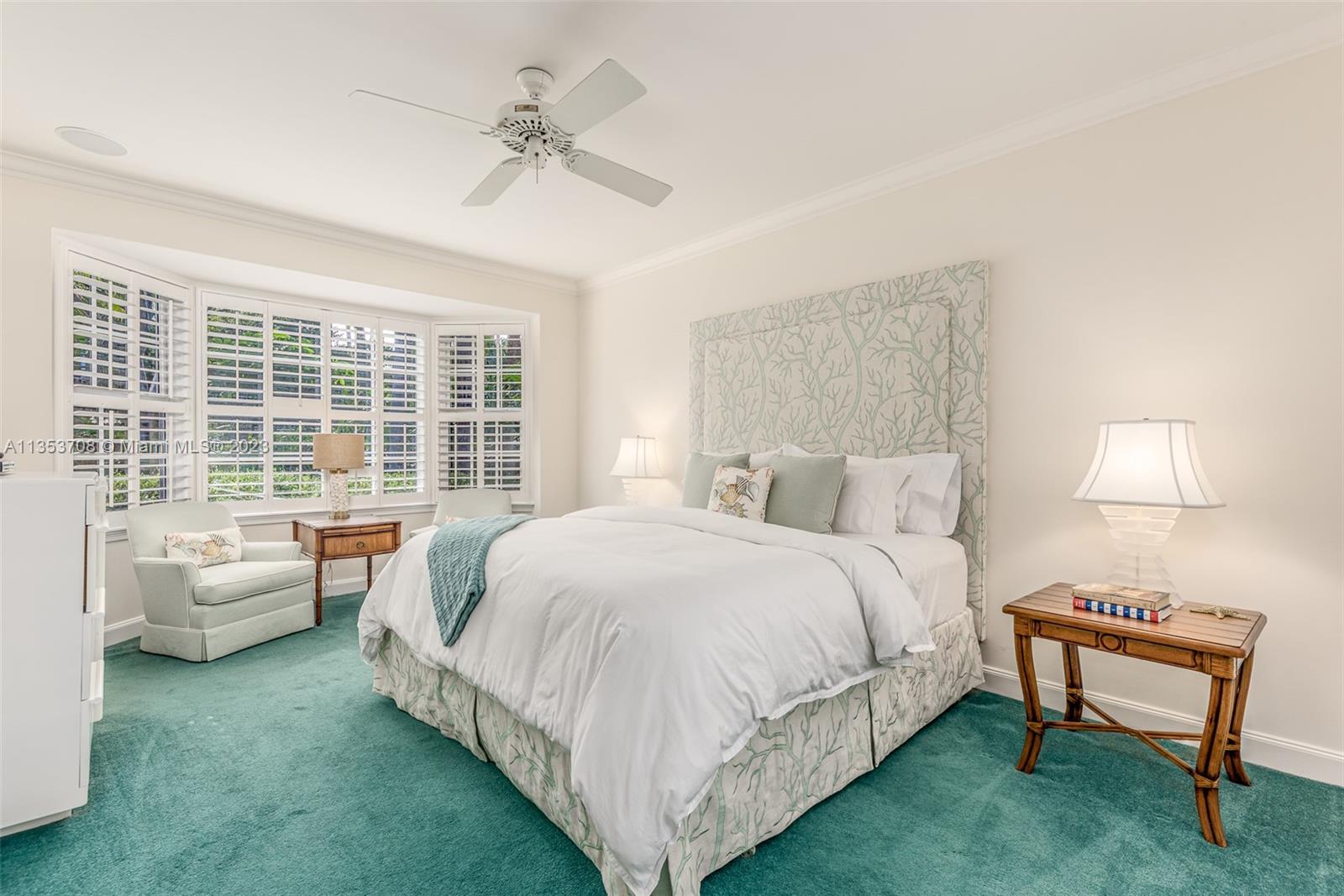 115 Gomez Road Jupiter Island, FL 33455 - Photo 7 of 20 a bed room with a bed and a chair