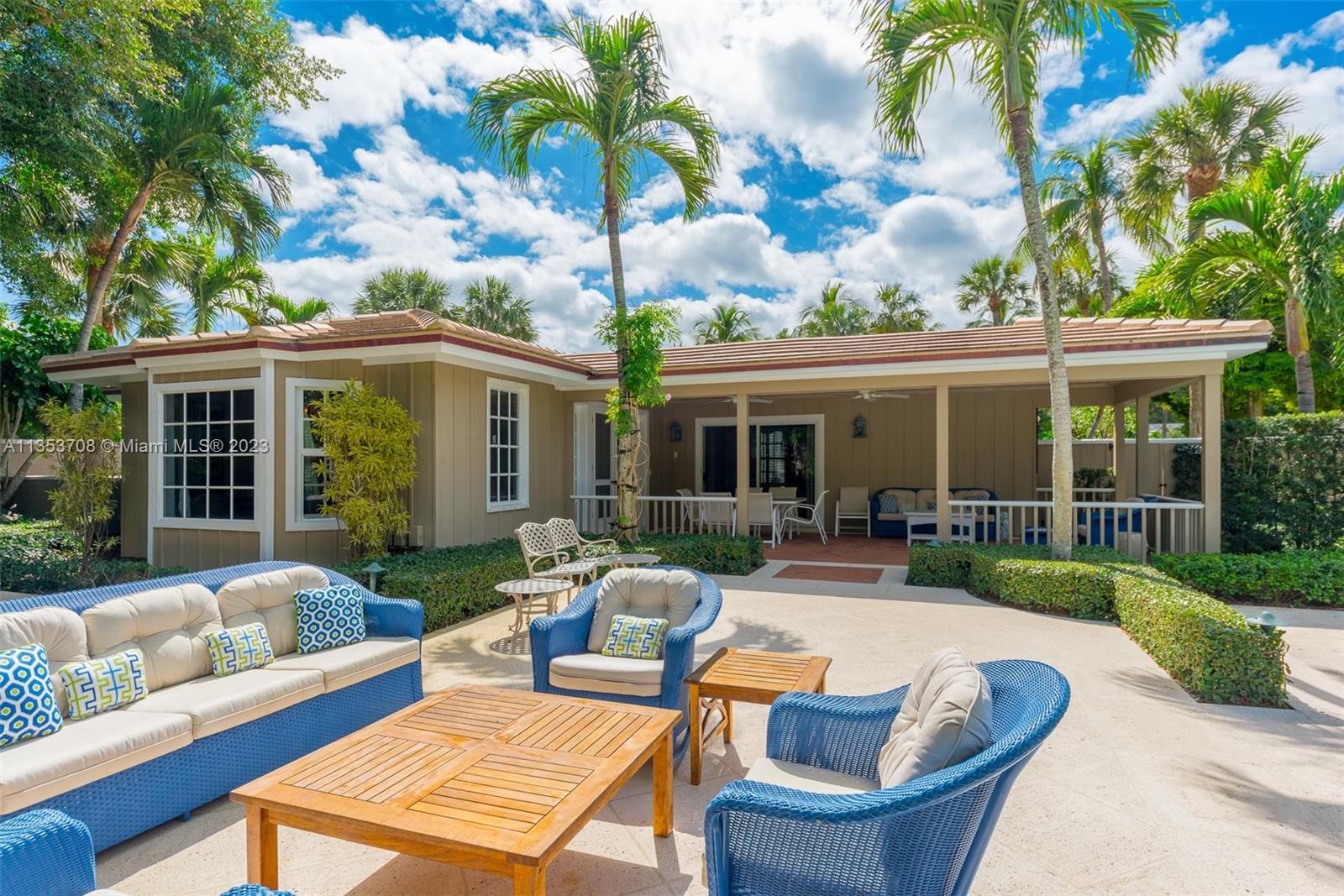 115 Gomez Road Jupiter Island, FL 33455 - Photo 10 of 20 a view of a house and a back yard with swimming pool