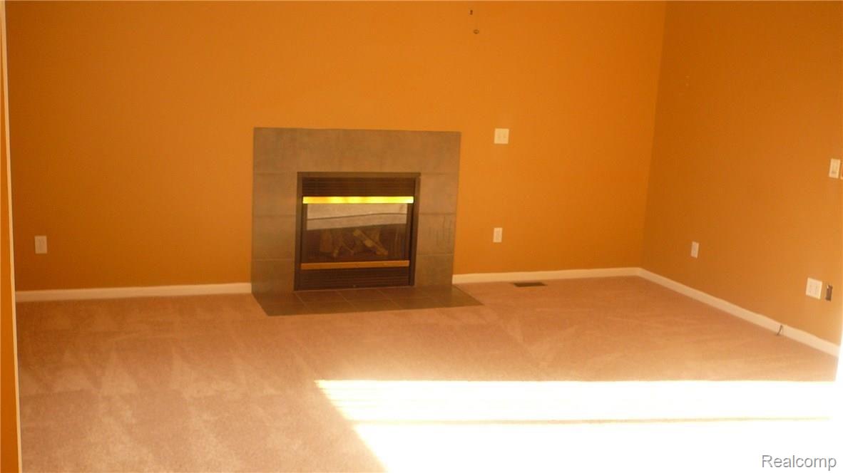 7999 Jeremy Road Belleville, MI 48111 - Photo 4 of 15 Family Room with an all new Carpet