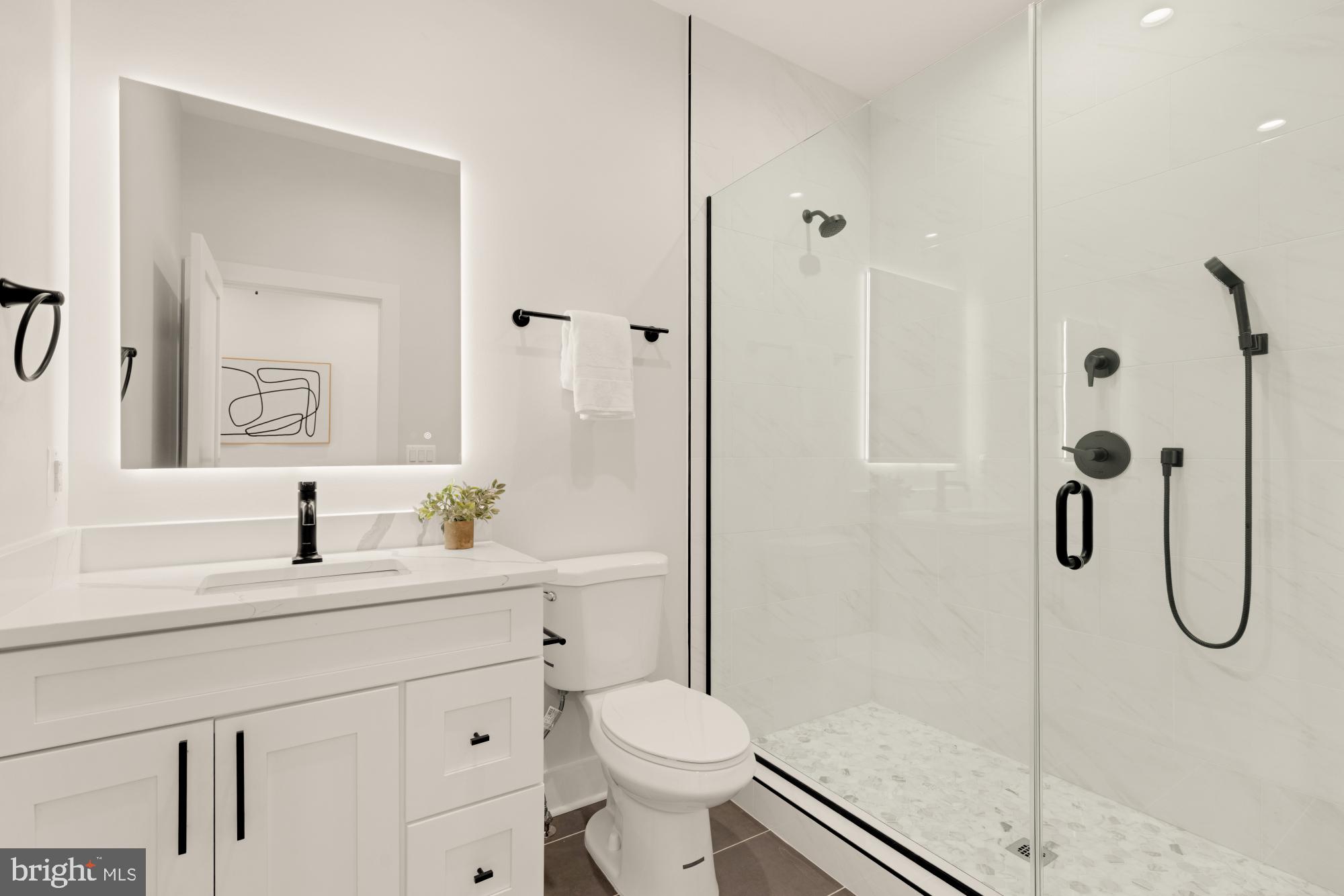 5505 7th Street Northwest, Unit 5 Washington, DC 20011 - Photo 15 of 27 a bathroom with a sink toilet and shower