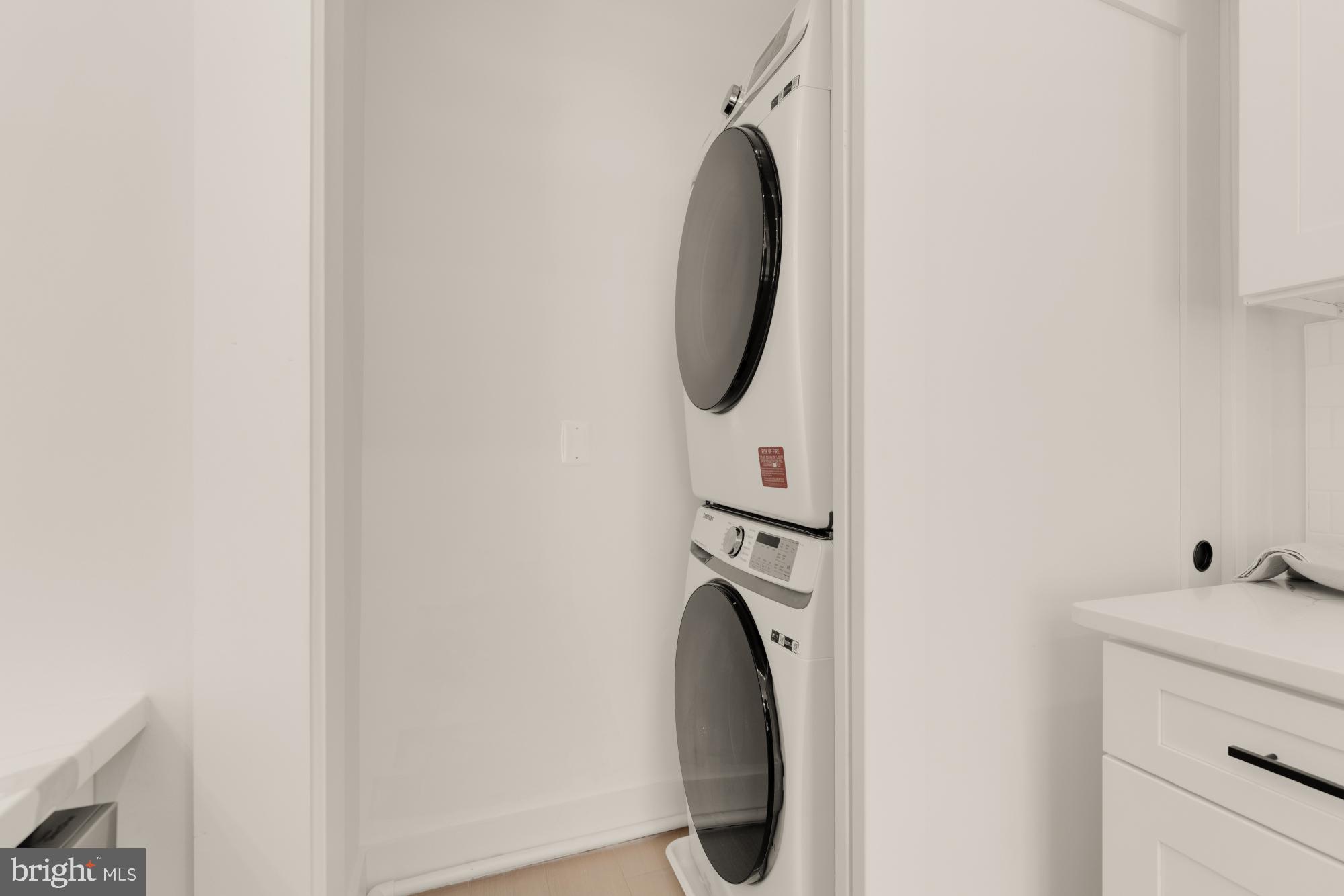 5505 7th Street Northwest, Unit 5 Washington, DC 20011 - Photo 10 of 27 a utility room with dryer and washer