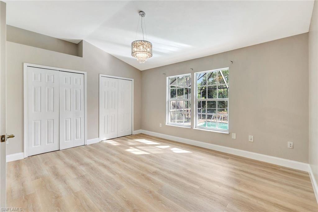 3650 Kent Drive Naples, FL 34112 - Photo 16 of 40 a view of an empty room with a window