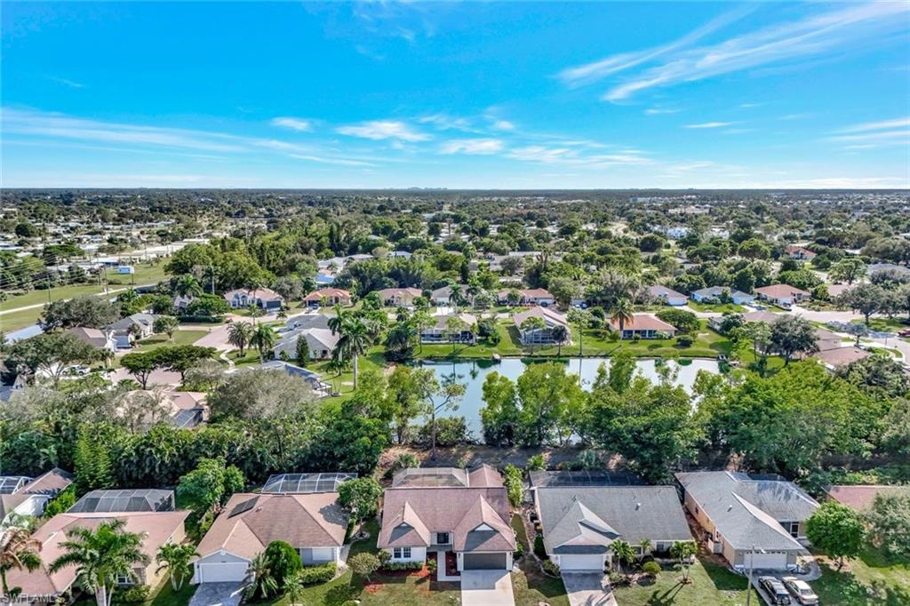 3650 Kent Drive Naples, FL 34112 - Photo 34 of 40 an aerial view of a city with lots of residential buildings