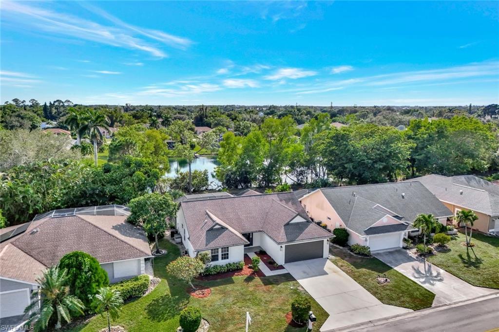 3650 Kent Drive Naples, FL 34112 - Photo 40 of 40 an aerial view of a house with a garden