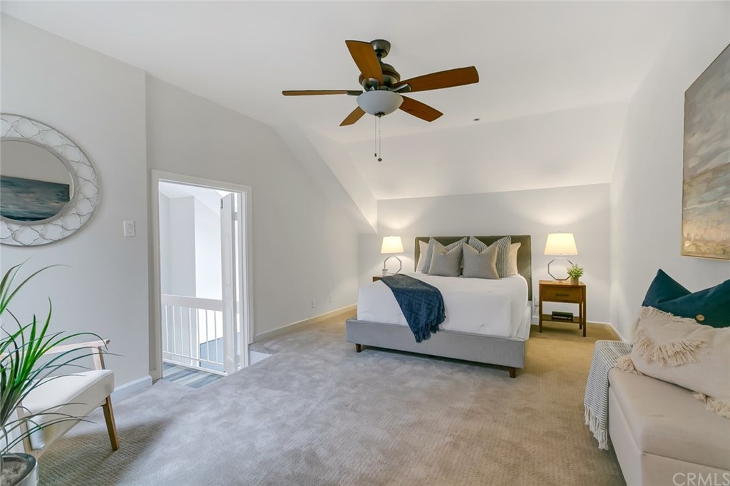 20331 Bluffside Circle, Unit A416 Huntington Beach, CA 92646 - Photo 29 of 42 a living room with furniture and a window