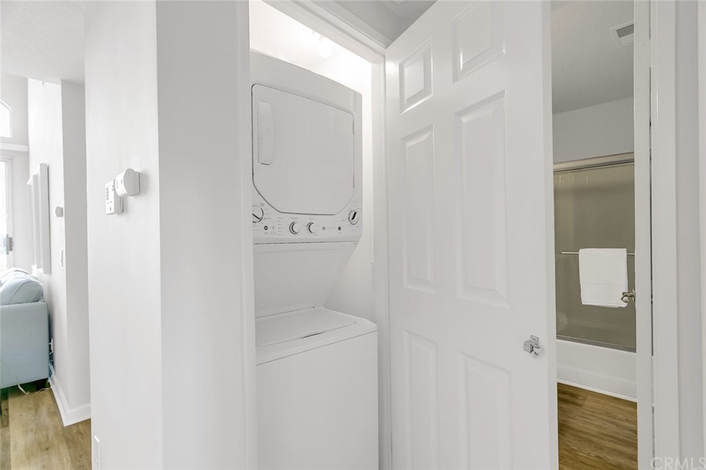 20331 Bluffside Circle, Unit A416 Huntington Beach, CA 92646 - Photo 32 of 42 a utility room with dryer and washer