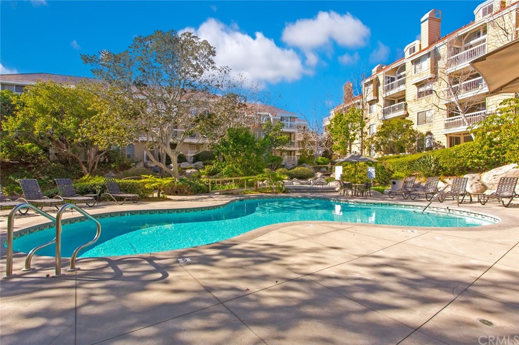 20331 Bluffside Circle, Unit A416 Huntington Beach, CA 92646 - Photo 35 of 42 a view of a fountain with a yard