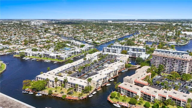 an aerial view of a city with lawn chairs