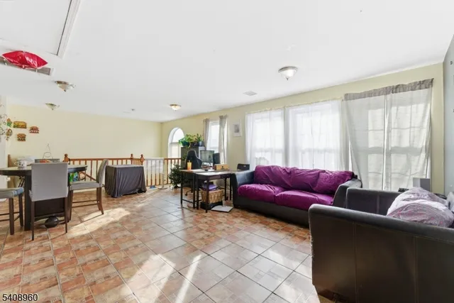 a kitchen with stainless steel appliances granite countertop a sink dishwasher stove top oven and cabinets