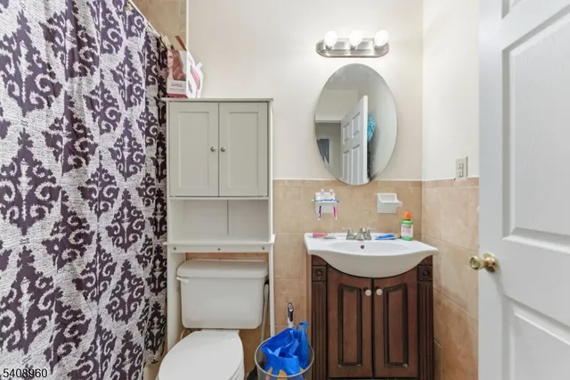 a kitchen with stainless steel appliances granite countertop a stove and a refrigerator