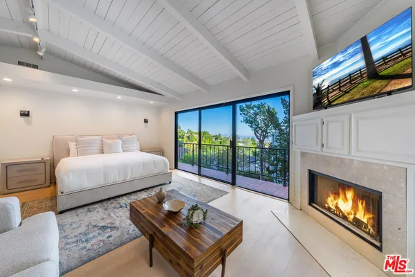 a bathroom with a tub sink and shower