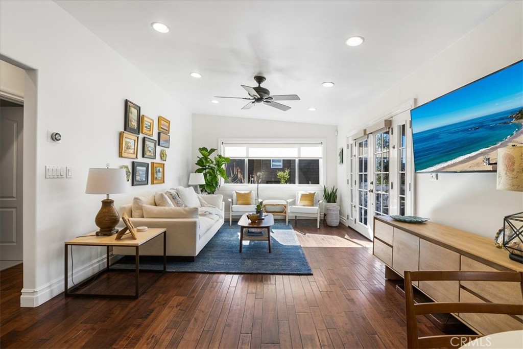 737 Griffith Way Laguna Beach, CA 92651 - Photo 2 of 22 a living room with furniture fireplace and wooden floor