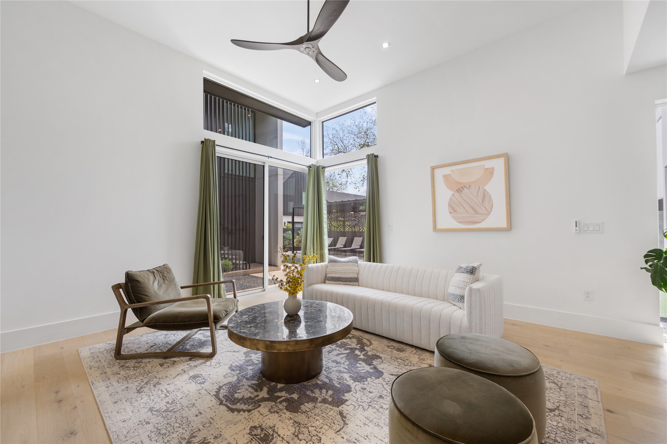 3201 Holton Street Austin, TX 78702 - Photo 11 of 39 Soaring ceilings and crisp white walls anchor the main living space