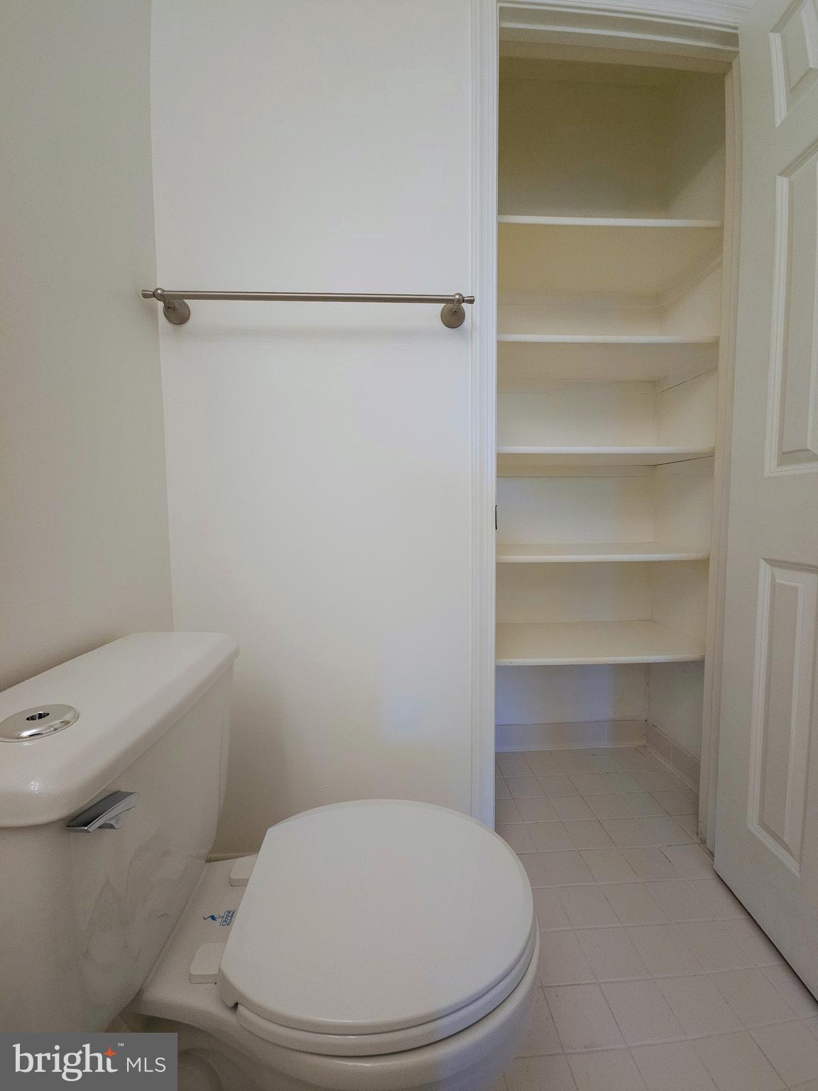 2014 Crosbyside Court Odenton, MD 21113 - Photo 27 of 58 a white toilet sitting next to a shower