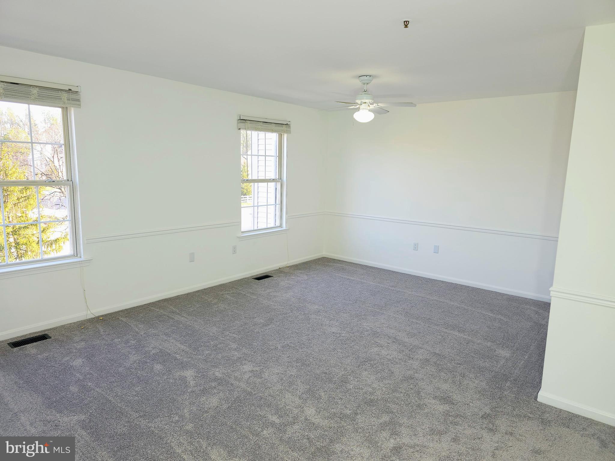 2014 Crosbyside Court Odenton, MD 21113 - Photo 31 of 58 an empty room with windows and closet