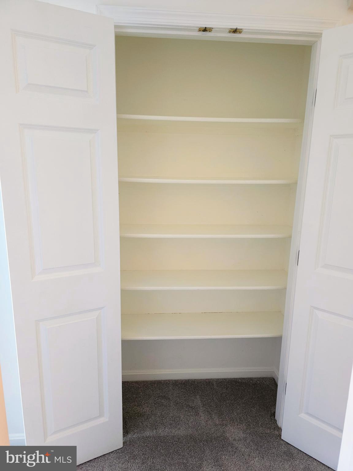 2014 Crosbyside Court Odenton, MD 21113 - Photo 41 of 58 a view of walk in closet with empty racks