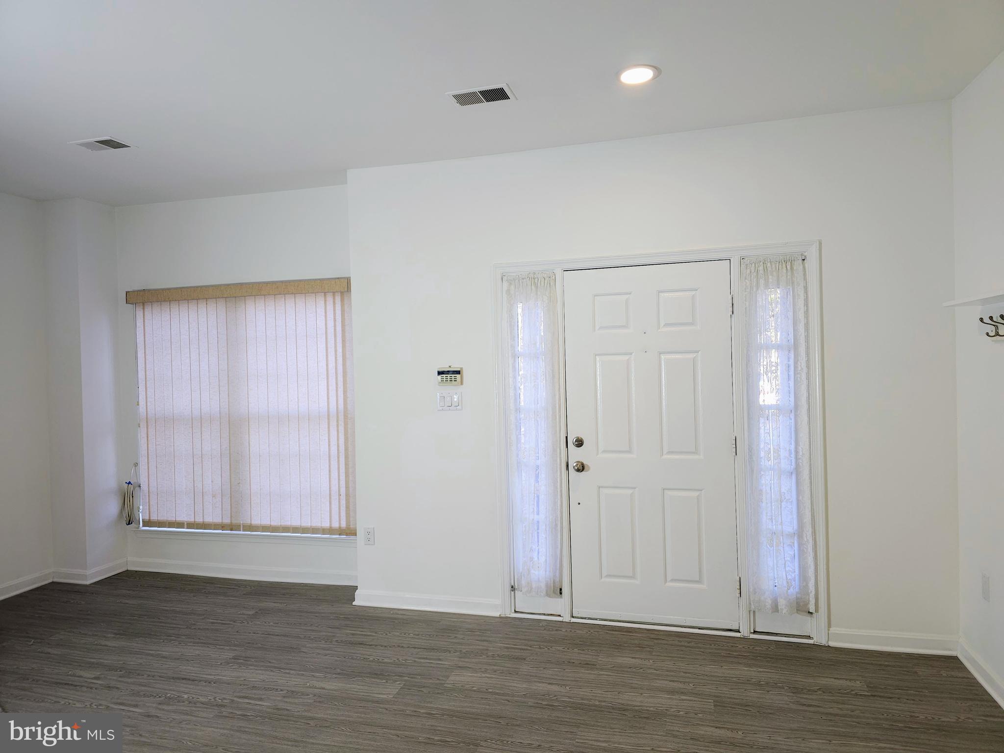 2014 Crosbyside Court Odenton, MD 21113 - Photo 5 of 58 a view of an empty room with wooden floor