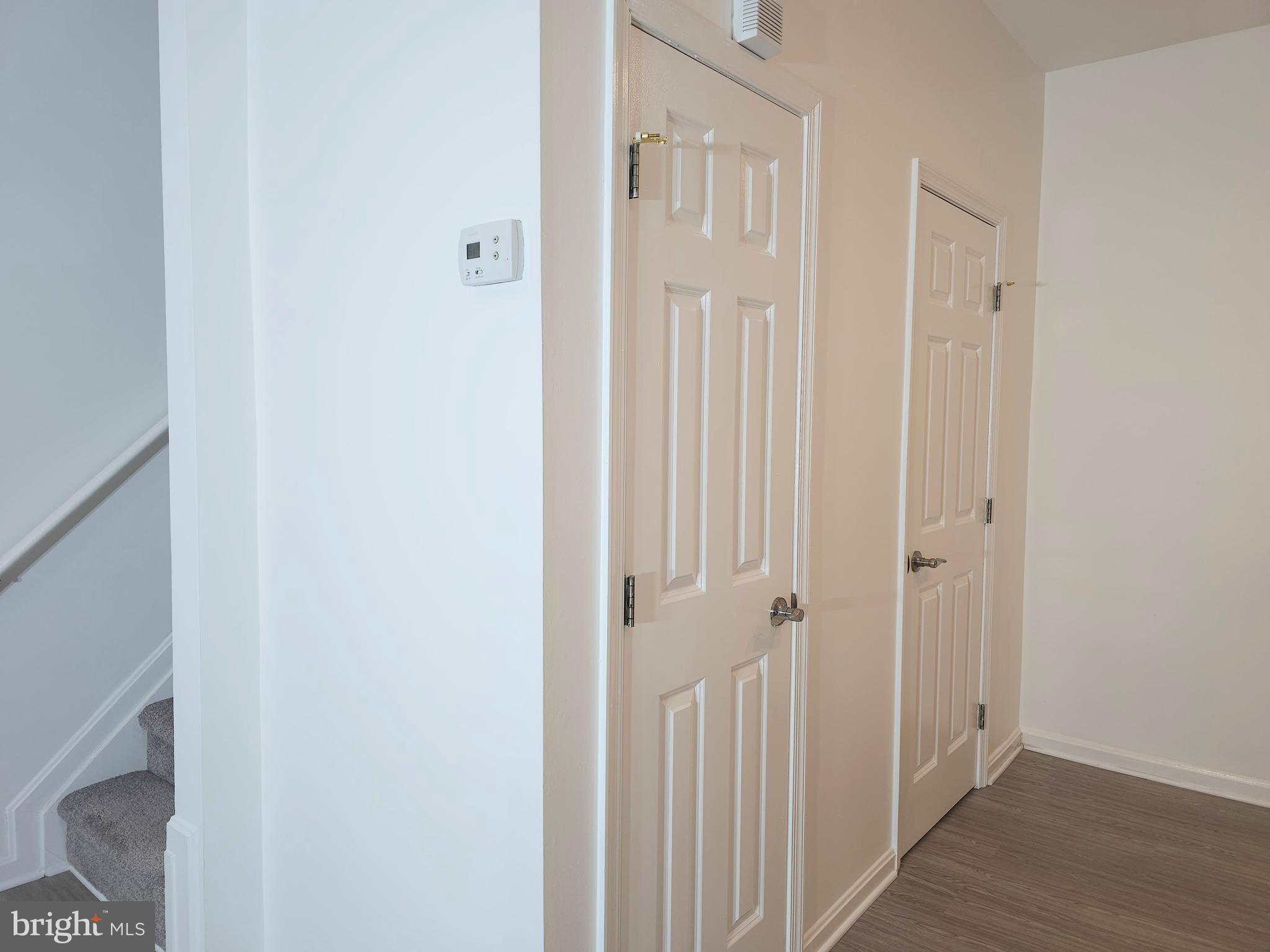 2014 Crosbyside Court Odenton, MD 21113 - Photo 56 of 58 a view of a hallway with wooden floor