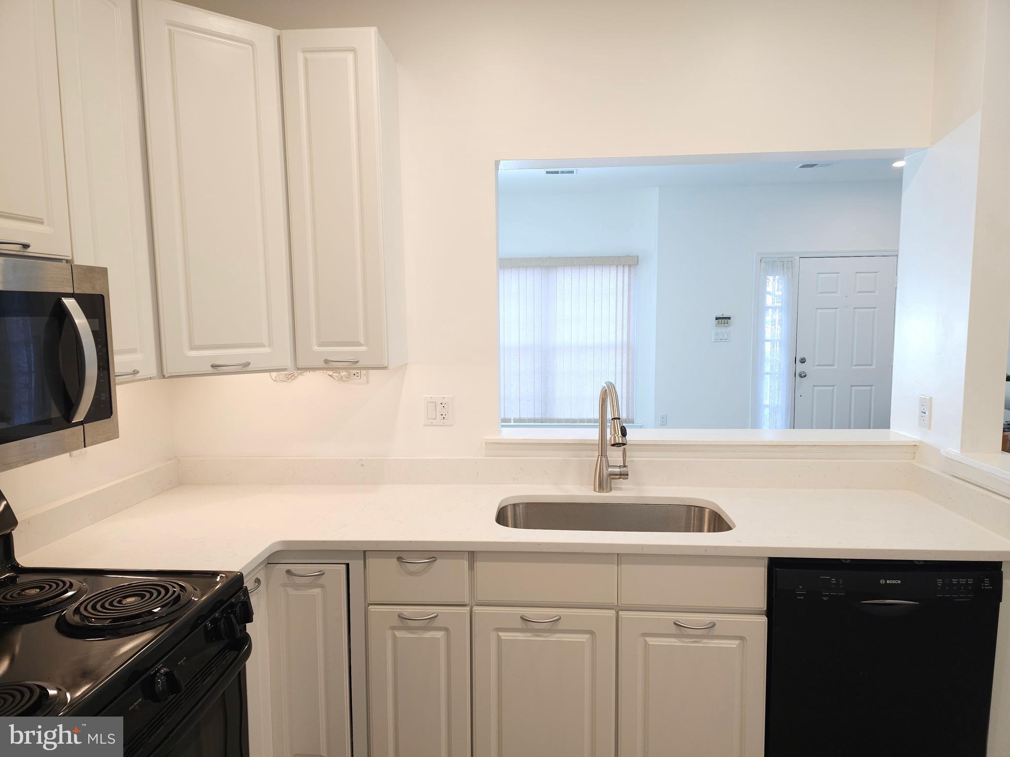 2014 Crosbyside Court Odenton, MD 21113 - Photo 10 of 58 a sink with a cabinets and window